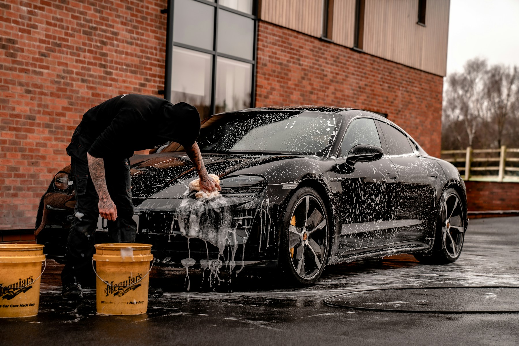 Representative image of a freshly detailed vehicle exterior and wheel